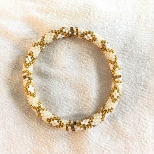gold and white beaded bracelet